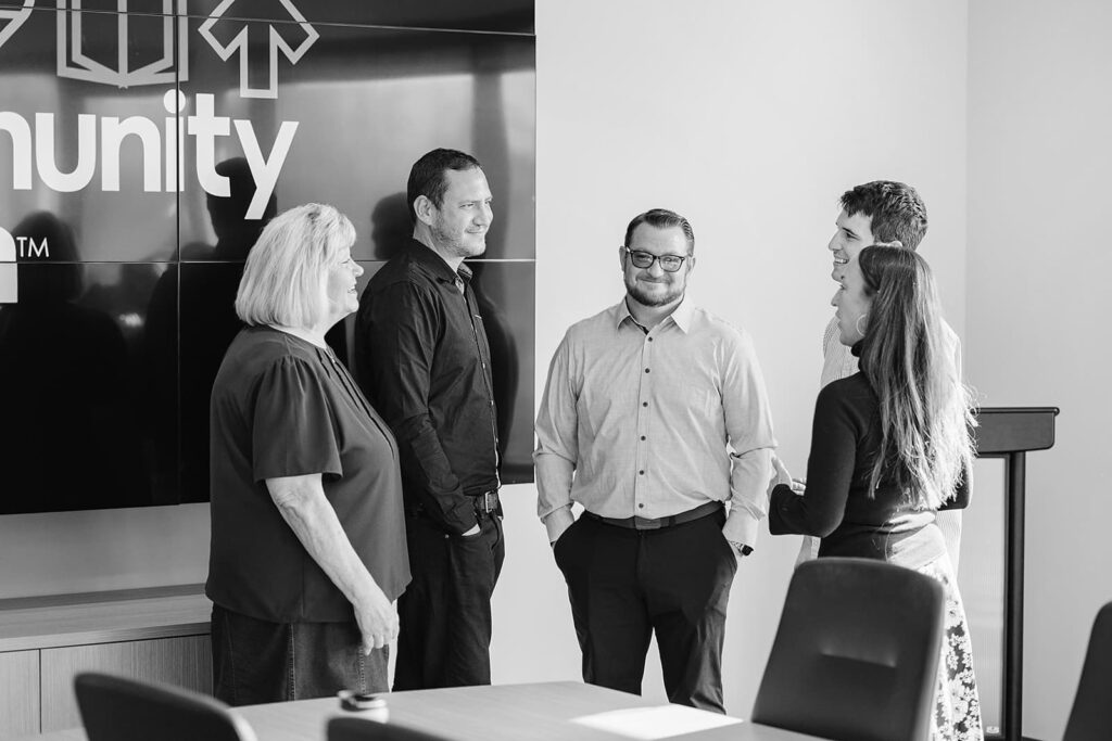 A group of professionals engaged in a discussion